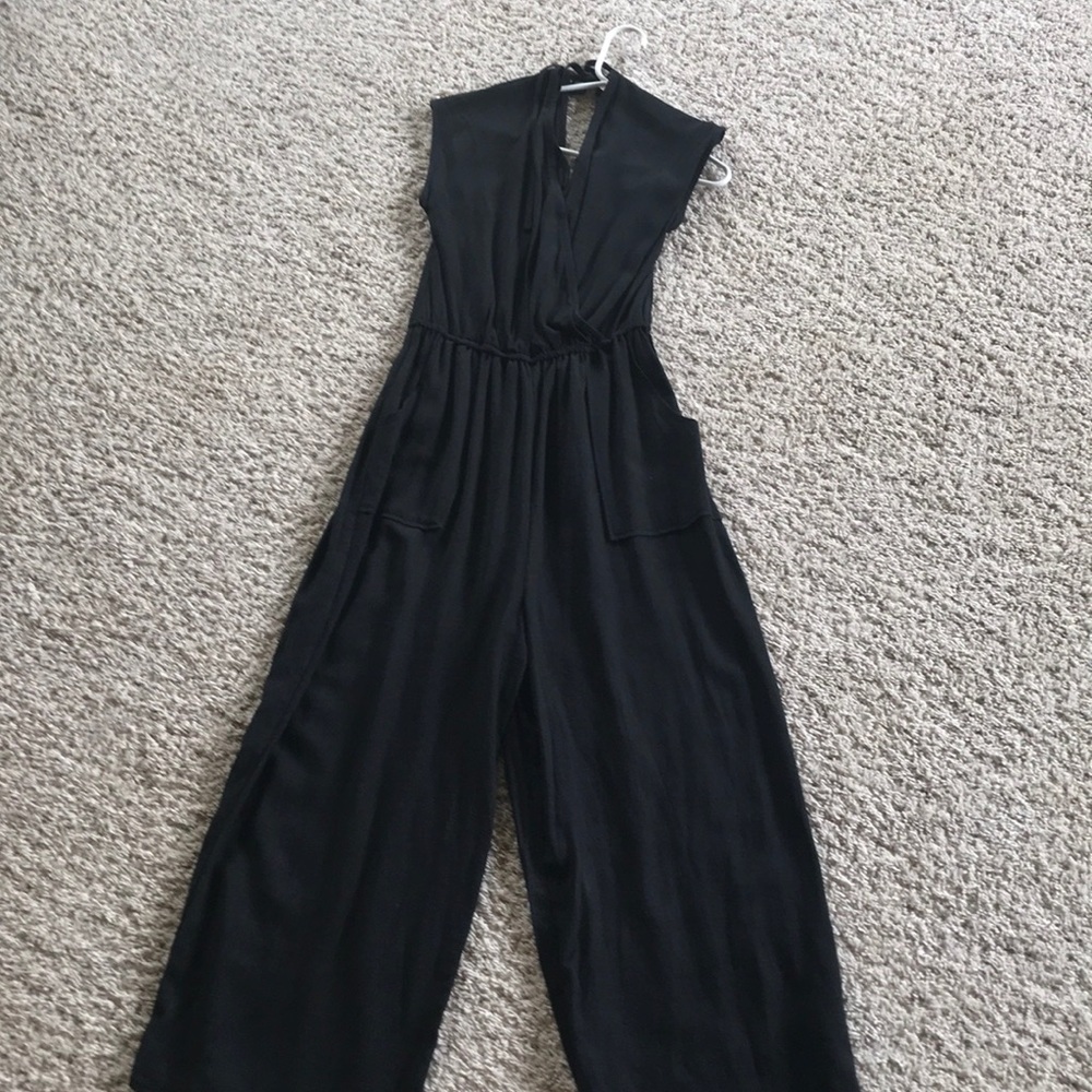 Black one piece sleeveless legged jump suit
